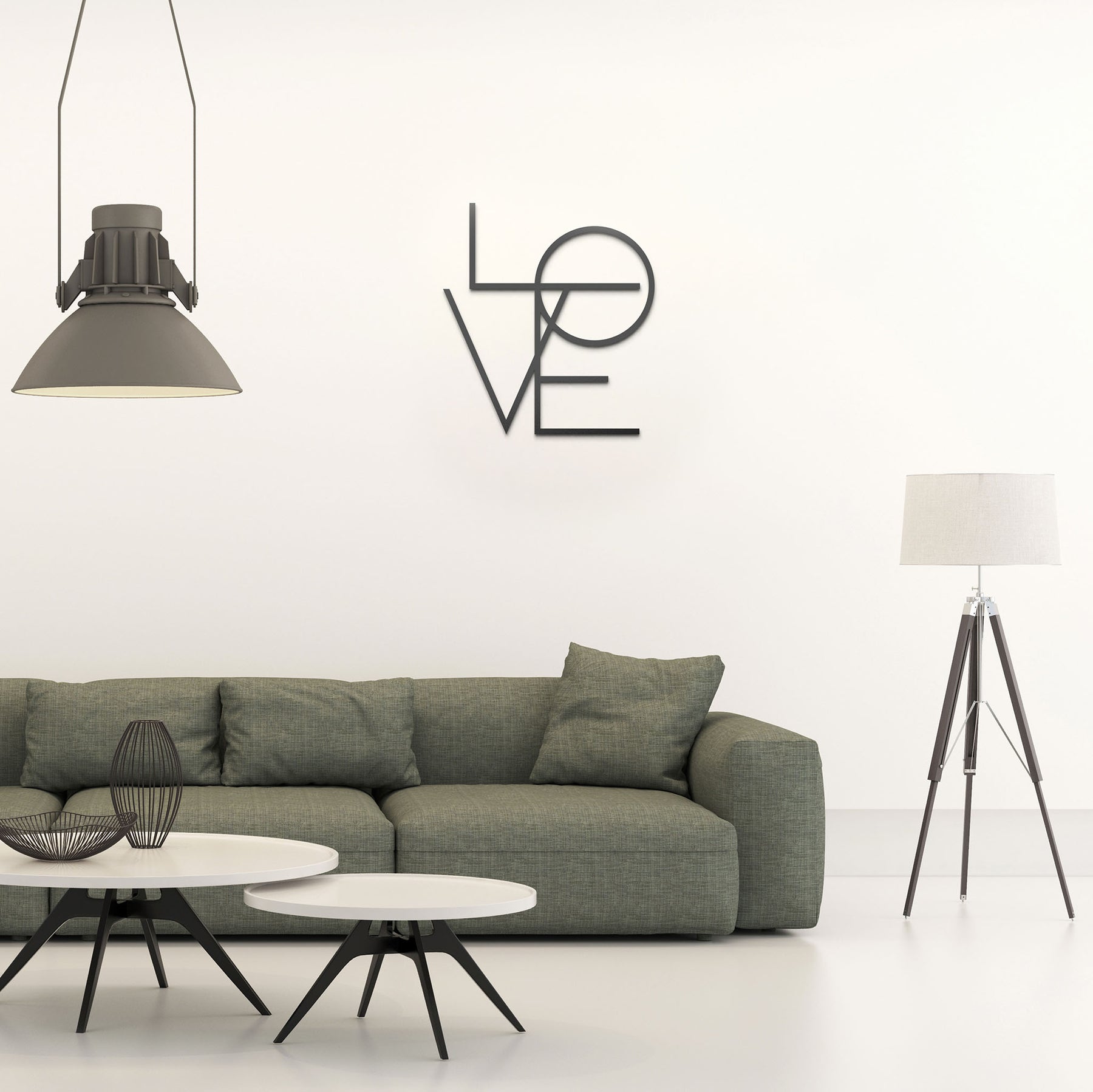 Mesi Love in einem minimalistischen Wohnzimmer mit gruenen Sofa